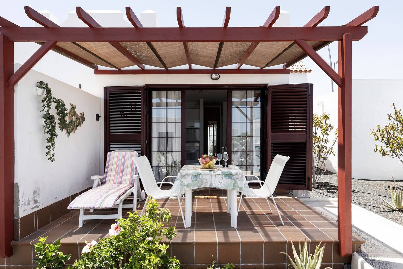 Ferienhaus „Oasis“ mit Gemeinschaftspool, privater Terrasse und Wlan in Caleta de Fuste, Antigua
