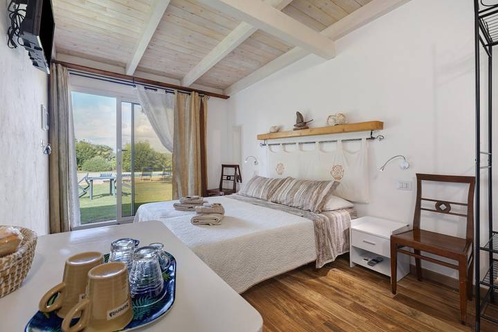 Hel lägenhet, Apartment 'Rosmarino' with shared pool, Wi-Fi and air conditioning in Alghero, Sassari provins