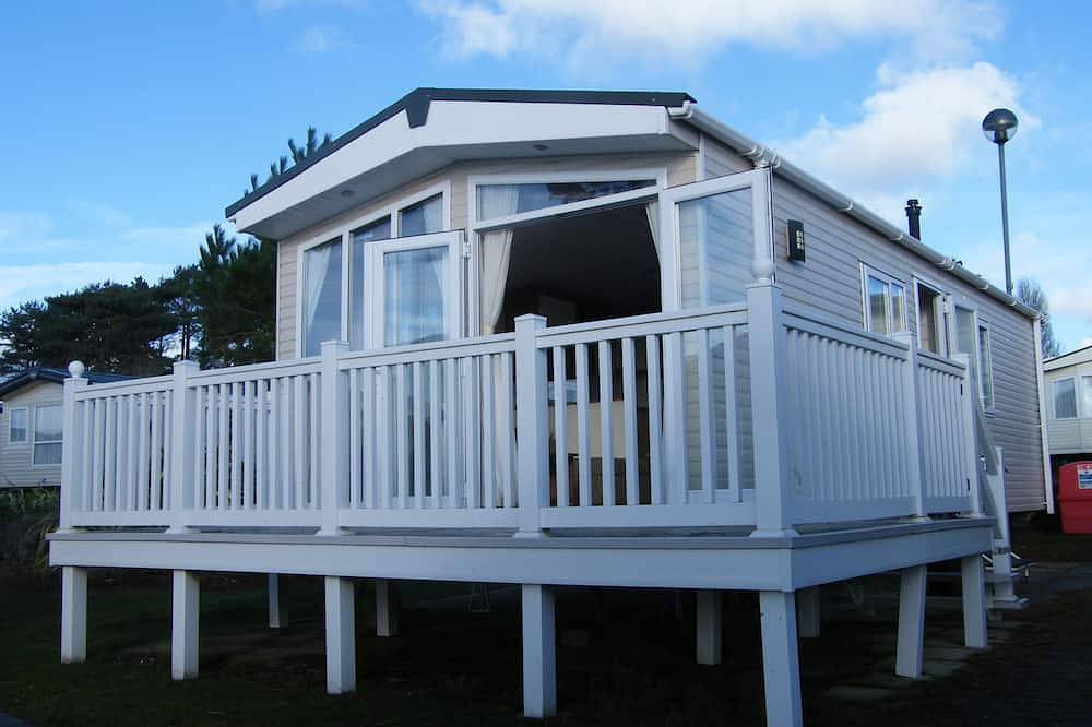 Lotus 2 bedroom dog friendly caravan with veranda offers a stunning sea view. in Poole, Poole Harbour