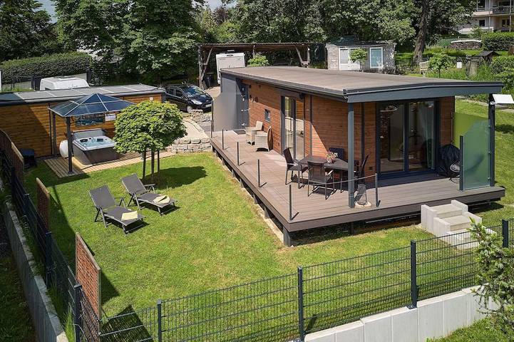 Ferienhaus für 4 Personen, mit Whirlpool und Terrasse sowie Garten und Sauna