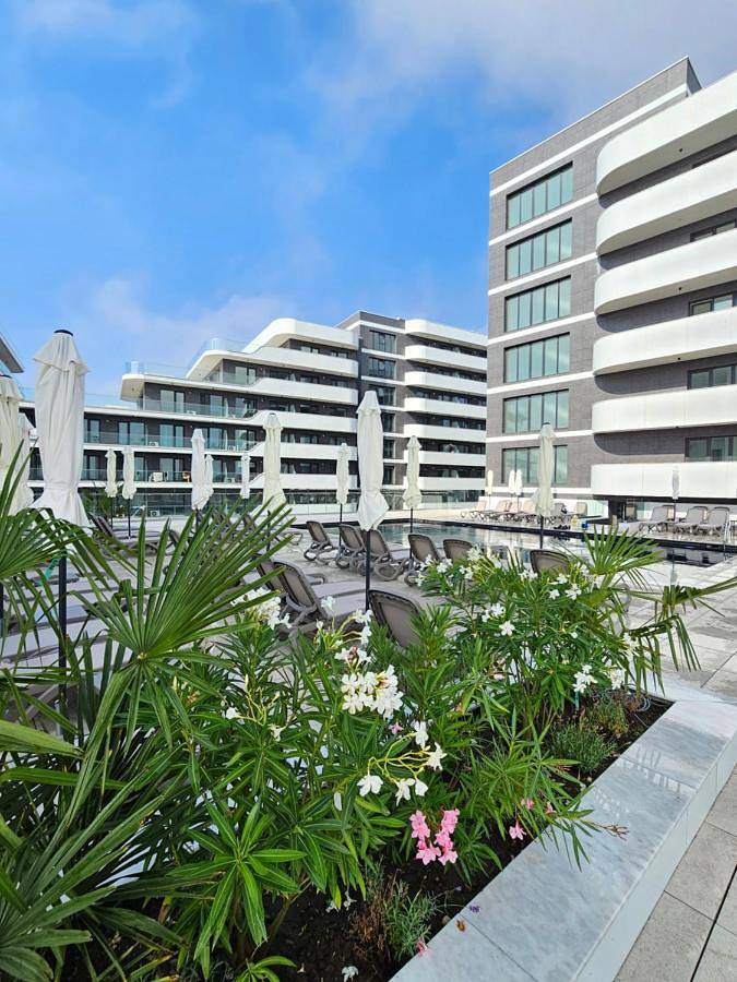 Appartement de vacances pour 4 personnes, avec sauna et vue ainsi que piscine et terrasse