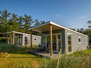 Ferienhaus für 4 Personen, mit Ausblick und Seeblick sowie Terrasse und Garten in 