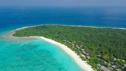 Station pour 4 personnes, avec piscine ainsi que vue et jardin dans Maldives