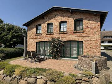 Ferienhaus für 2 Personen, mit Terrasse und Seeblick an der Ostsee