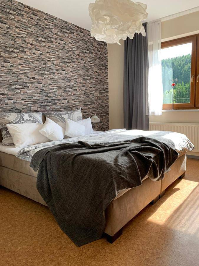 Ferienwohnung für 5 Personen, mit Terrasse und Garten sowie Ausblick