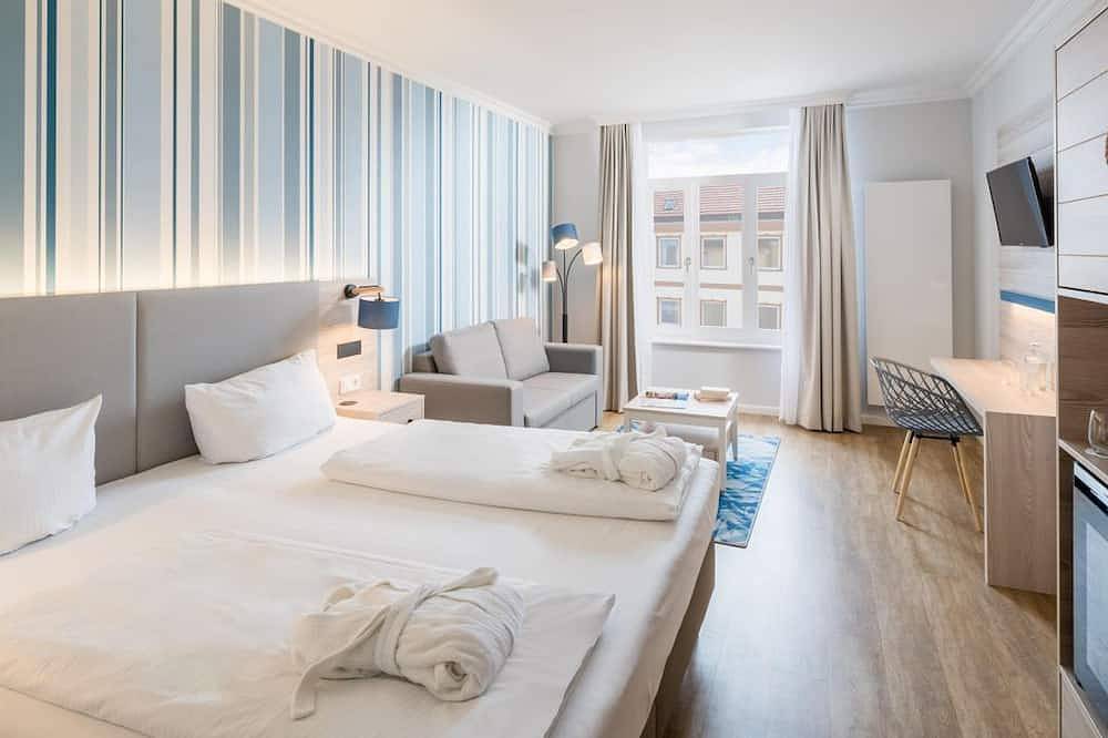 Doppelzimmer seitlicher Seeblick - Frühbucherrate - Strandhotel Gerken in Wangerooge