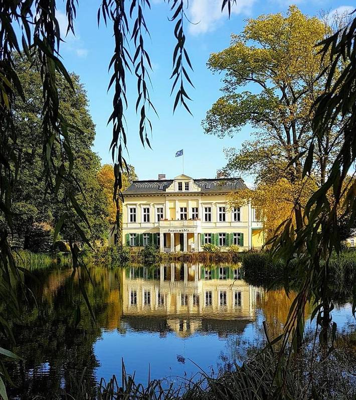 Ferienwohnung für 4 Personen, mit Terrasse und Garten sowie Sauna und Seeblick