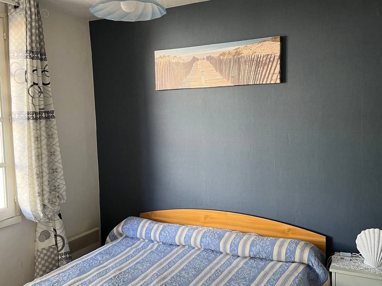 Casa encantadora com jardim, a 10 minutos da praia, ideal para casais ou pequenas famílias in Le Grand-Village-Plage, Côte de Beauté
