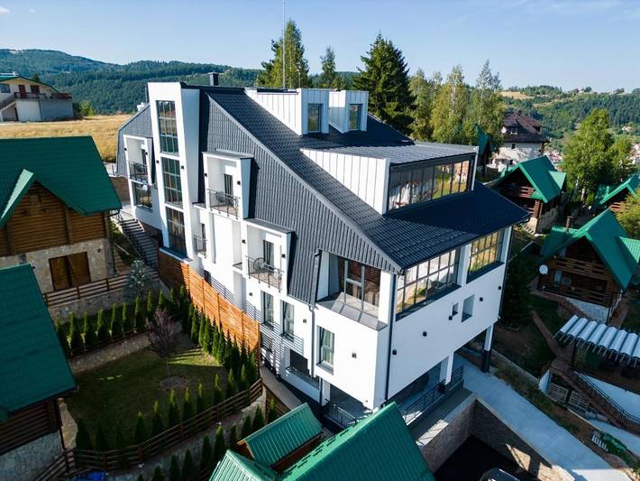 Appart’hôtel pour 2 personnes, avec jacuzzi et balcon ainsi que sauna et jardin