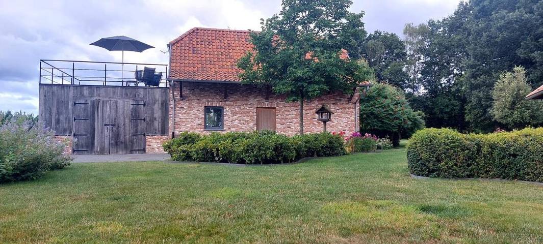 Location de vacances pour 2 personnes, avec Terrasse ainsi que Jardin et Vue à Kruishoutem