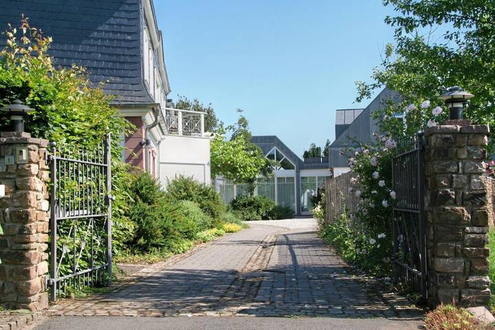 Ferienwohnung für 4 Personen, mit Balkon und Garten sowie Pool und Sauna