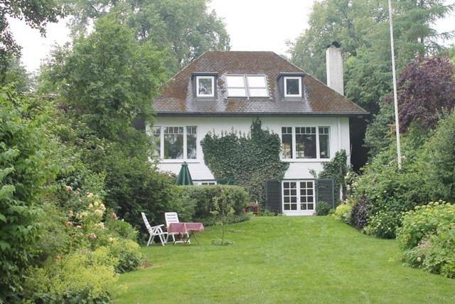 Ferienwohnung für 3 Personen, mit Terrasse und Garten sowie Seeblick und Ausblick in Naturpark Westensee