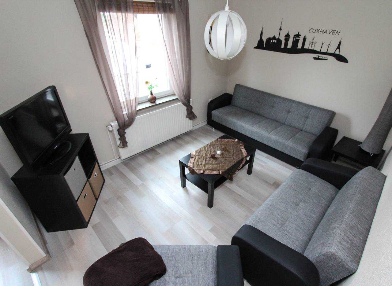 Ferienhaus 'Olenbrook' mit gemeinsamer Terrasse, Gemeinschaftsgarten und Wlan in Altenbruch, Cuxhaven
