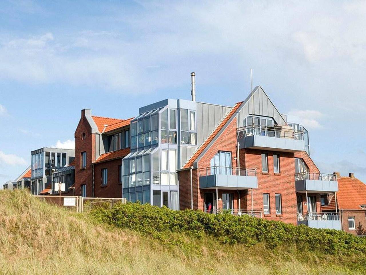Ganze Ferienwohnung, Haus Dünenblick - Ferienwohnung mit sonniger Loggia mit Blick zum Wattenmeer - nur 70 m zum Strand in Wangerooge