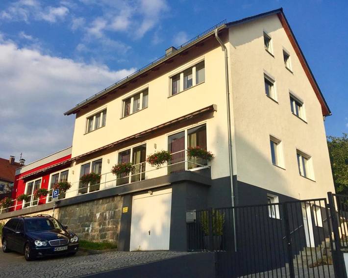 Ferienwohnung für 3 Personen, mit Terrasse und Garten sowie Ausblick
