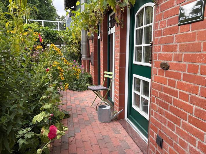 Ferienwohnung für 3 Personen, mit Terrasse und Garten sowie Ausblick