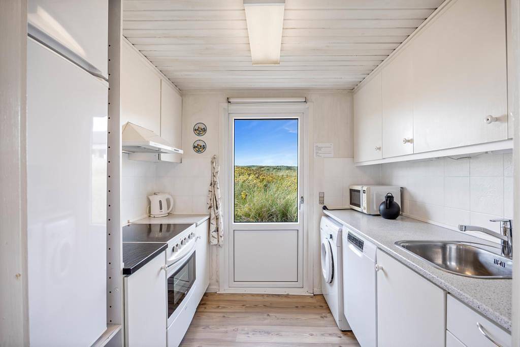 Ferienhaus mitten in den Dünen mit Panoramaaussicht in Bjerregård, Holmsland Klit