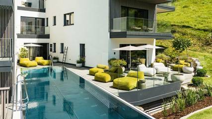 Ferienwohnung für 6 Personen, mit Sauna und Balkon sowie Pool und Garten in Schladming
