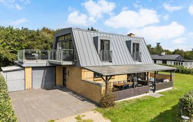 Ferienhaus mit Meerblick für 6 Personen, mit Whirlpool und Garten sowie Terrasse am Ringkøbing Fjord
