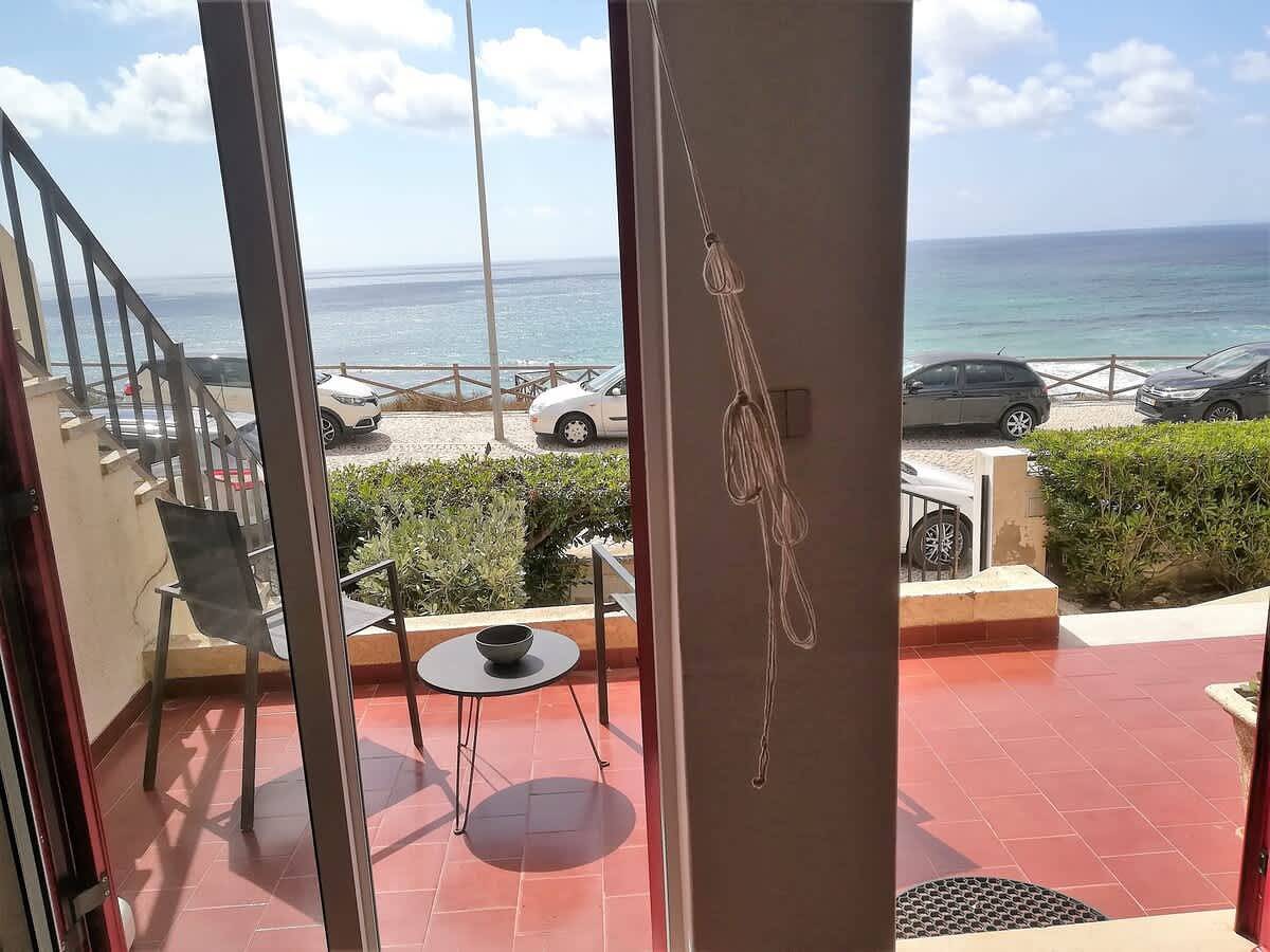 Apartamento inteiro, Apartamento de férias para 4 pessoas com varanda/terraço in Praia da Areia Branca, Lourinhã