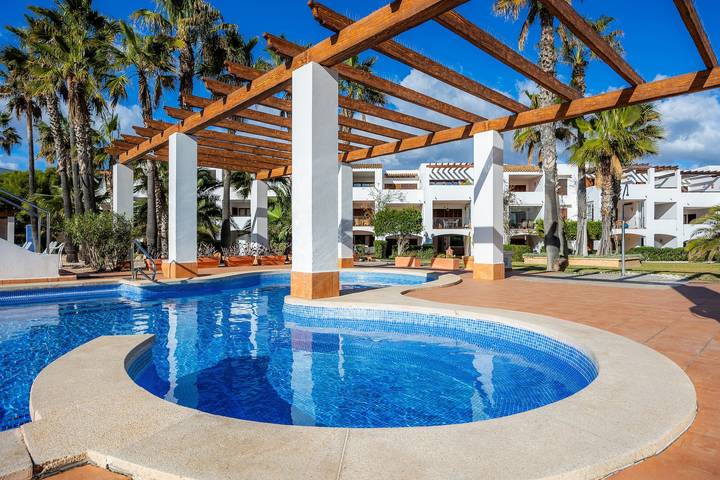 Ferienwohnung für 4 Personen, mit Balkon und Garten sowie Kinderpool in Santanyí