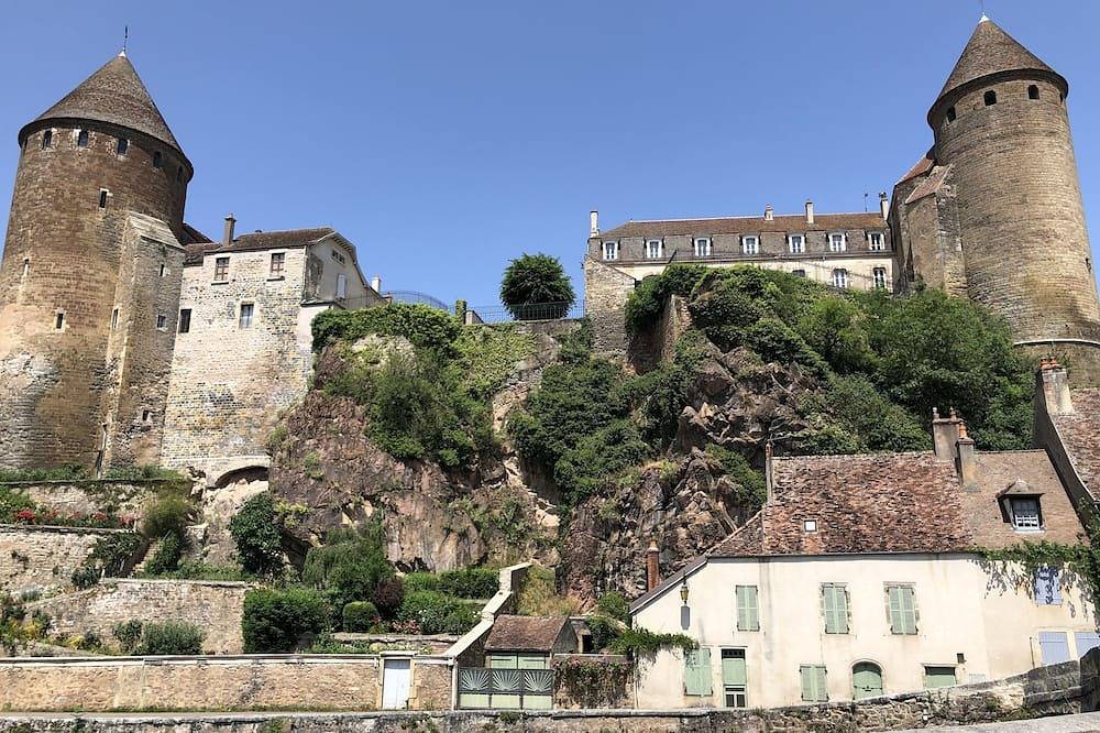 Pont Pinard building and its pink granite for 2 in Semur-en-Auxois, Montbard region