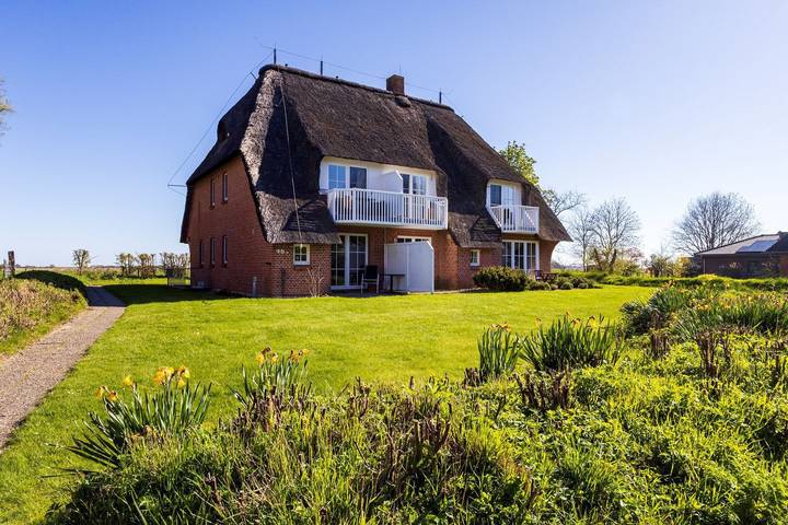 Strandhaus für 7 Personen, mit Balkon und Garten sowie Ausblick in Sankt Peter-Ording