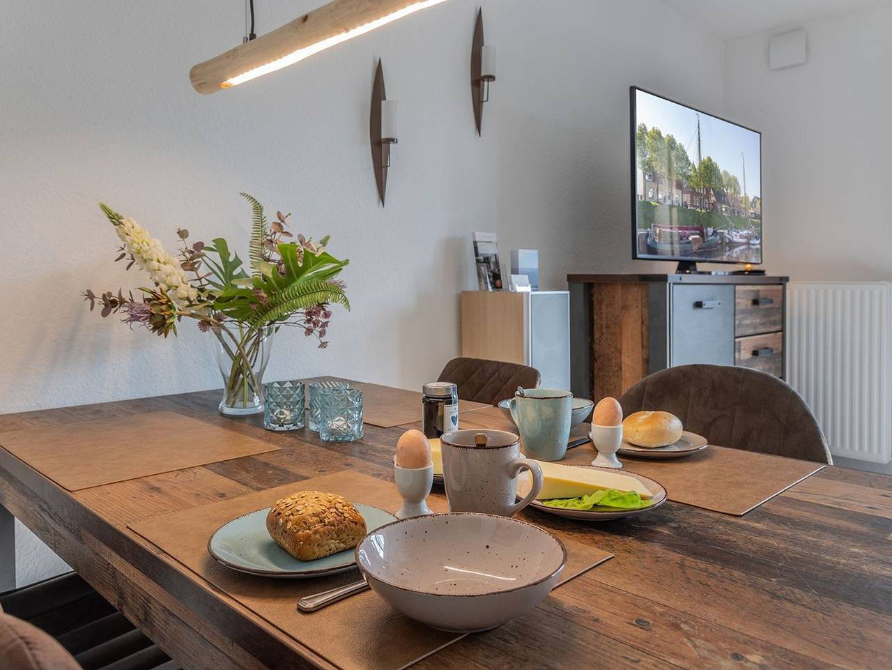 50062 "Leev mare" - Raffiniertes Refugium in Altfunnixsiel: Stilvoll-modern eingerichtet, top gepflegt und ideal für Familien. Mit komplett eingezäuntem Garten, viel Ruhe und großzügigem Wohnbereich ein perfekter Rückzugsort für Ihren Urlaub. in Altfunnixsiel, Wittmund