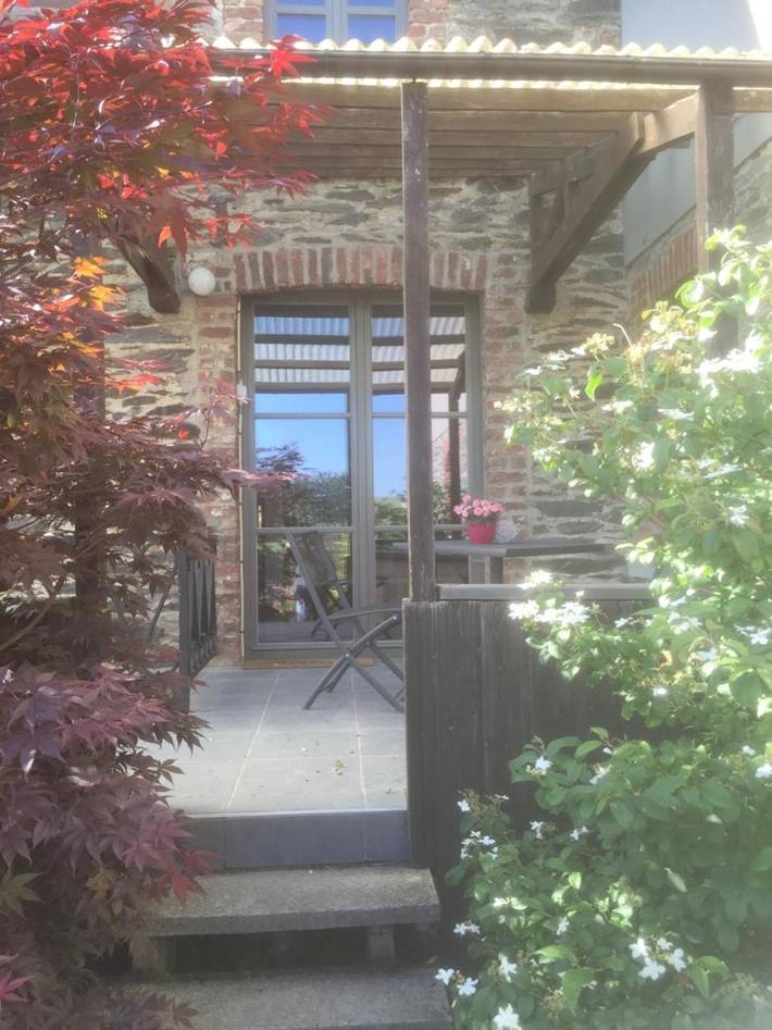 Location de vacances pour 10 personnes, avec terrasse ainsi que vue et jardin à Tenneville