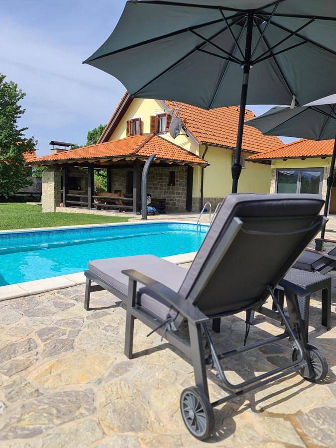 Ferienhaus für 7 Personen, mit Sauna und Garten sowie Ausblick und Pool