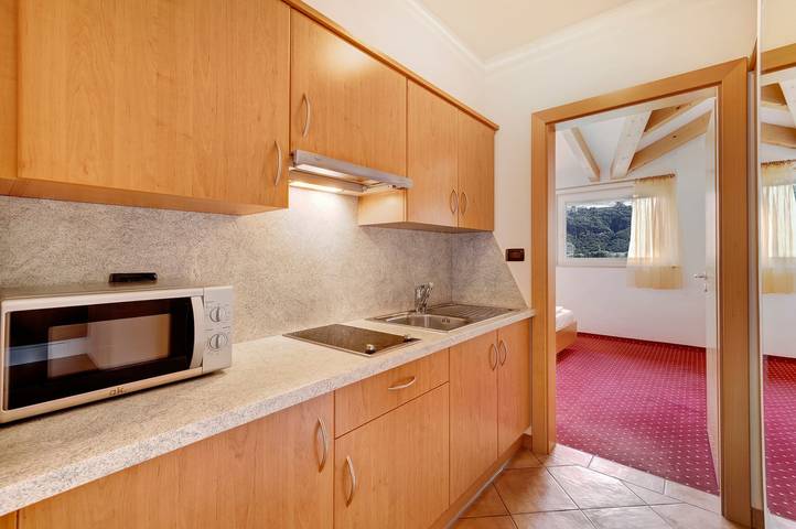 Appartamento intero, Appartamento vacanze "Weinsepphof 4" con vista montagna, piscina, Wi-Fi, giardino e balcone in Lana di Mezzo, Lana