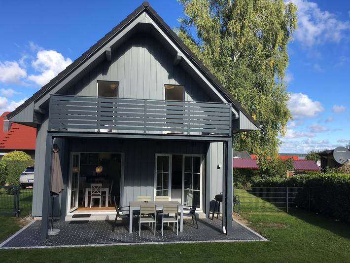 Ferienhaus für 6 Personen, mit Balkon und Terrasse sowie Garten