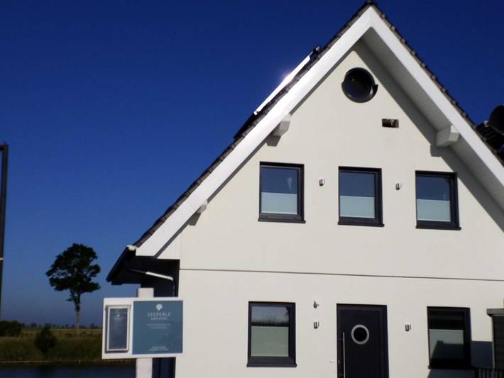 Ferienhaus für 7 Personen, mit Balkon und Terrasse sowie Seeblick in Landkreis Wittmund - 4