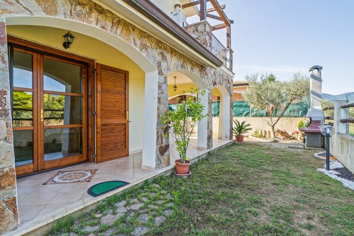 Ferienhaus für 4 Personen, mit Balkon und Garten