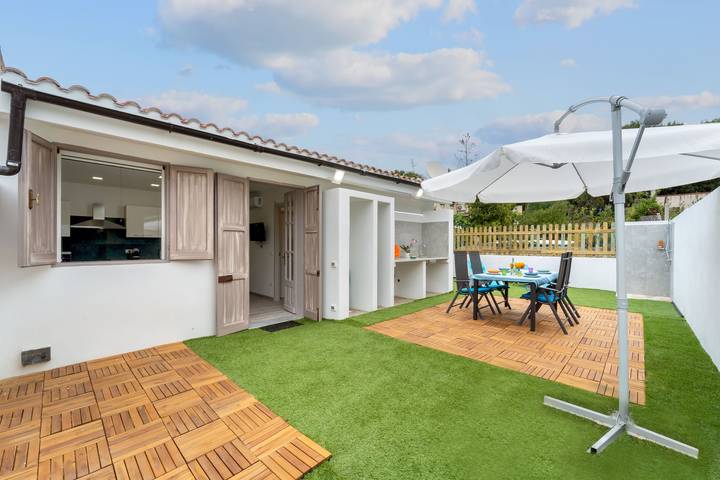 Maison de vacances pour 4 personnes, avec Jardin dans Portixeddu