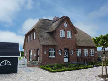 Ferienhaus für 4 Personen, mit Terrasse und Sauna sowie Garten, mit Haustier in Utersum