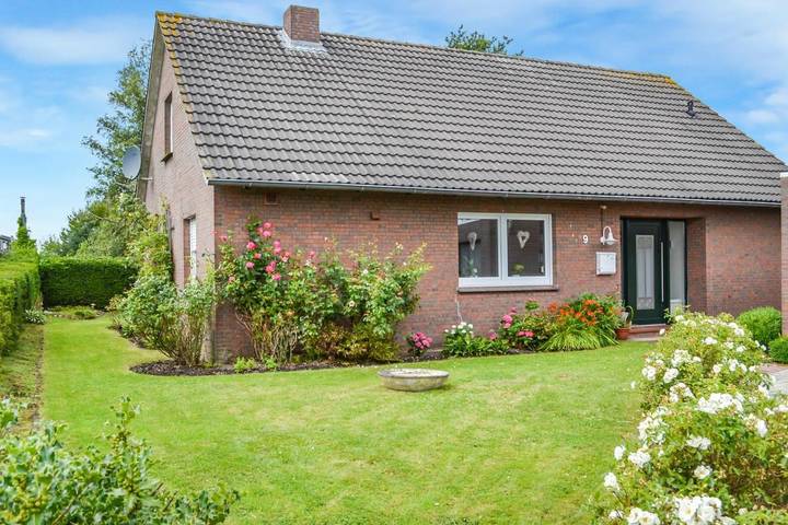 Ferienhaus für 5 Personen, mit Terrasse und Garten sowie Seeblick und Ausblick in Hinte