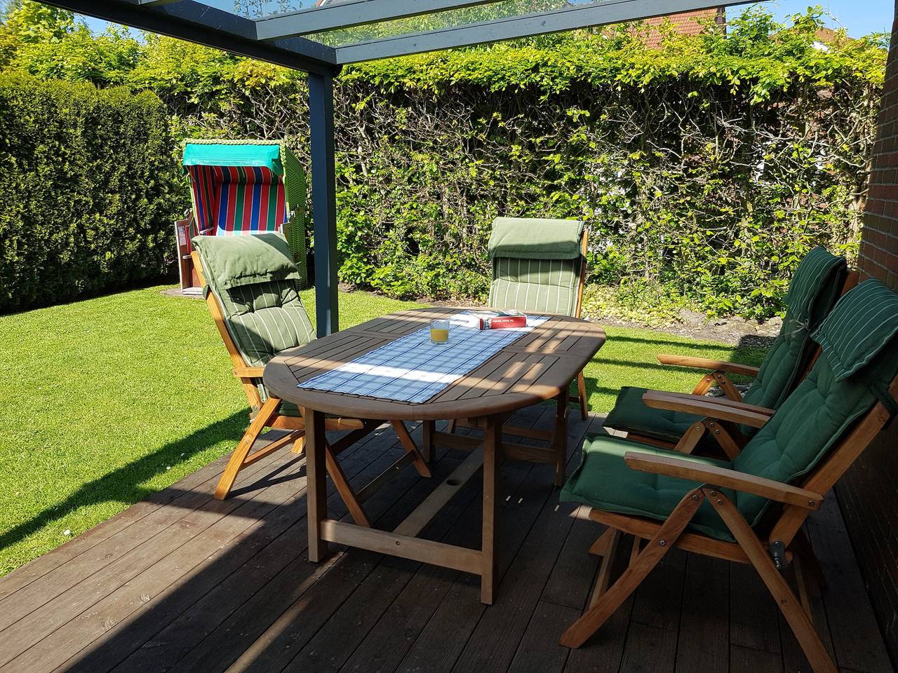 Ganze Wohnung, Apartment 'Fewo Tenge Eg Links' mit überdachter Terrasse, privatem Garten und Wlan in Hooksiel, Wangerland