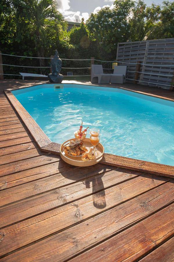 Location de vacances pour 12 personnes, avec piscine ainsi que vue et jardin dans Plage du Grand Macabou - 3