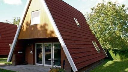 Ferienhaus für 4 Personen, mit Seeblick und Garten sowie Terrasse, kinderfreundlich in Landkreis Aurich