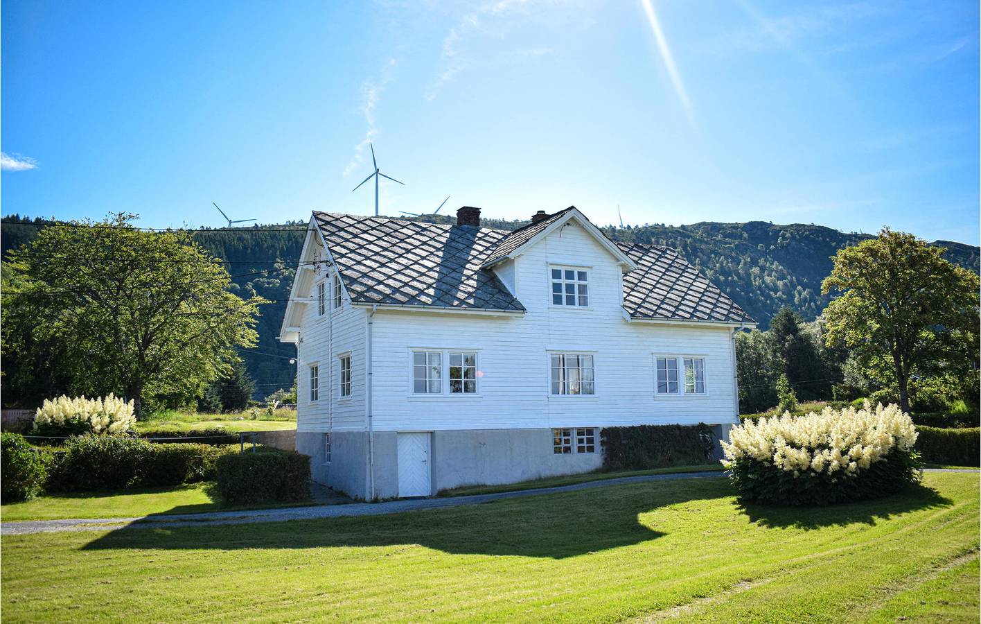 Ferienhaus für 8 Personen mit Garten in Fitjar