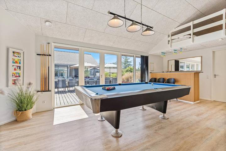 Activity holiday home in Blåvand with pool table, swimming pool and outdoor hot tub in Blavand, Varde Region