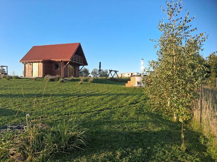 Domek letniskowy dla 6 osób, z ogród i widok oraz basen i widok na jezioro, zwierzęta dozwolone w Niegocin