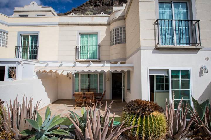 Apartamento para 4 personas, con piscina y jardín además de vistas y piscina para niños, Familias con niños en Puerto Rico (Gran Canaria)