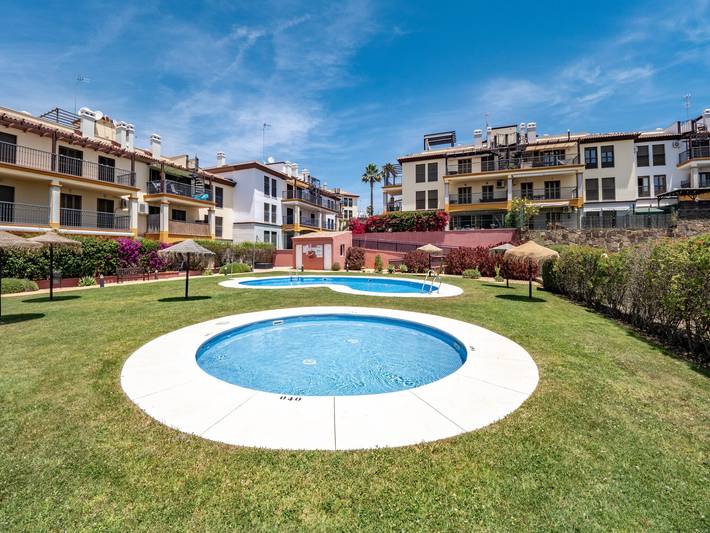 Casa de férias para 4 pessoas, com piscina infantil e terraço, adaptado a crianças em Urbanizacion Costa Esuri