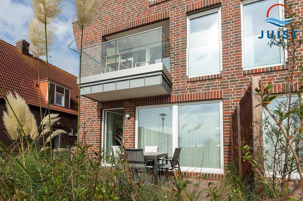 Familien- und hundefreundliche moderne Ferienwohnung mit Südterrasse am Watt — Bild 3