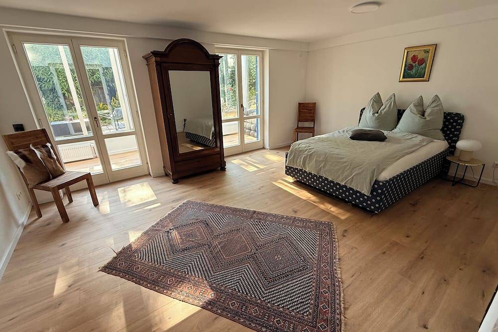 Entire apartment, A Retreat on Lake Ammersee, 2-room apartment, 87 square meters, 5 minutes to the lake, relaxing garden, pet-friendly in Utting am Ammersee, Ammersee