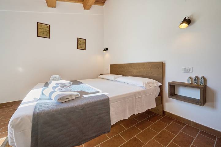 Kamer 'Santa Lorica - Camera 18' met gedeeld zwembad, wifi en airconditioning in Sassetta, Etruskische kust
