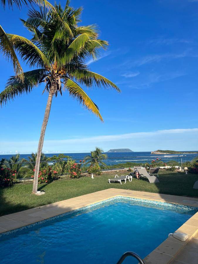 Cottage pour 6 personnes, avec piscine ainsi que vue et jardin dans Anse A La Gourde Saint Francois