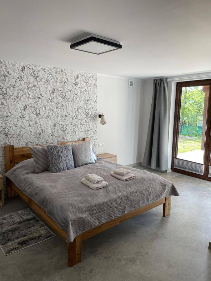 Ferienwohnung für 4 Personen, mit Garten und Seeblick sowie Ausblick, mit Haustier